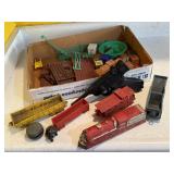 Toy trains, gun, blocks