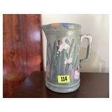 Hand painted pottery pitcher