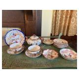 Japanese teapot, cups, saucers, bowl