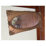 Ornate gold wall mirror