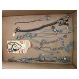 Silver costume jewelry necklaces, pendants