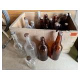 Woden crate, brown, clear beverage bottles