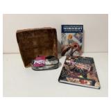 Needlecraft books, sewing kit, basket