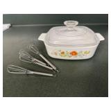 Corningware covered casserole dish, whisks