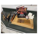 Meat Lovers cookbook, cutting board, knives,