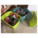 Storage totes of memorial florals, stakes (2)