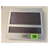 Sharp Atomic battery operated clock