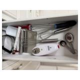 Contents of kitchen utensil drawer