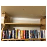 Shelf of paperback books
