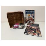 Needlecraft books, sewing kit, basket