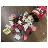 Coffee can of matchbooks