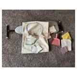 Toy iron, ironing board, clothespin bag, potholder