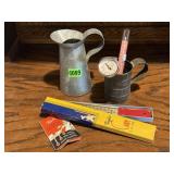 Vintage liquid measuring cups, thermometers