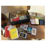Assorted playing cards, score cards, dice