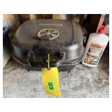 Portable tailgate charcoal grilllighter fluid