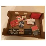 Cribbage board, playing cards, Rook card game