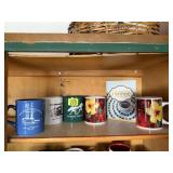Shelf of coffee mugs, coffee book