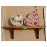Wood shelf, china tea cup, saucer, heart tin