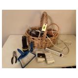Basket of power cords, surger protectors,
