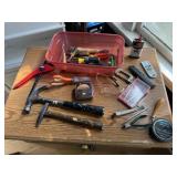 Assorted hand tools, hammer, scissors, tape