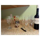 Wine bottle, wine glasses, champagne flutes,