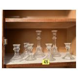 Clear glass candlesticks (7)