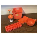 Orange food chopper, ice trays, batter bowl,