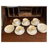 White china cups, saucers, plates