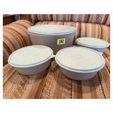 Blue Tupperware storage bowls