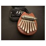 Miniature kalima thumb piano
