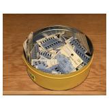 Tin of sewing notions, hooks, snaps