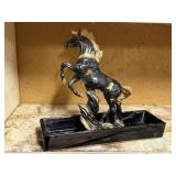 Black stoneware dish, horse statue