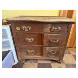 Antique serpentine chest of drawers
