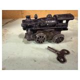 Antique cast iron wind up locomotive