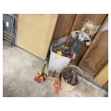 Baskets of pinecones, pumpkin, fall leaves, paper