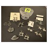 Glass dish of earrings