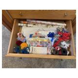 Gift wrapping supplies, paper, bows, tags, bags,