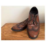 Wing tip dress shoes