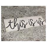 'This is Us' sign