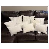 Mixed lot of white throw pillows