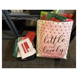 Mixed lot of new, used gift bags, tissue paper