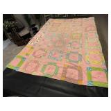 Pink tie scrap quilt