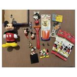 Assorted Mickey Mouse souvenirs, wallpaper border,