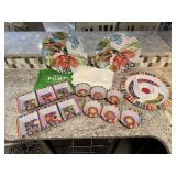 Plastic serving dishes, platters, table linens