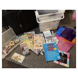 Tote of scrapbook paper, stickers, stencils