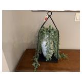 Decorative lantern, greenery, vase