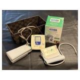 Blood pressure monitor, extra cuff, basket