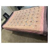 Pink floral scrap tie quilt