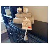 Storage books, orbs, It's a Great Day wall hanging