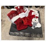 Assorted Christmas stockings, hangers